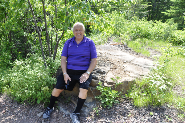 Lee chooses to rest on a shady rock